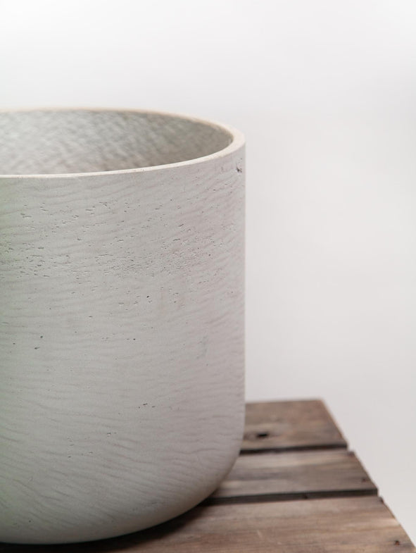 The Charlie pot is made from fibre clay, it looks like stone but is much lighter.